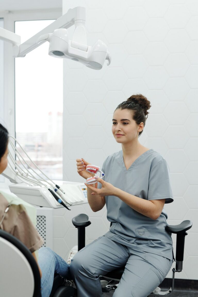 Dentist consulting with a patient