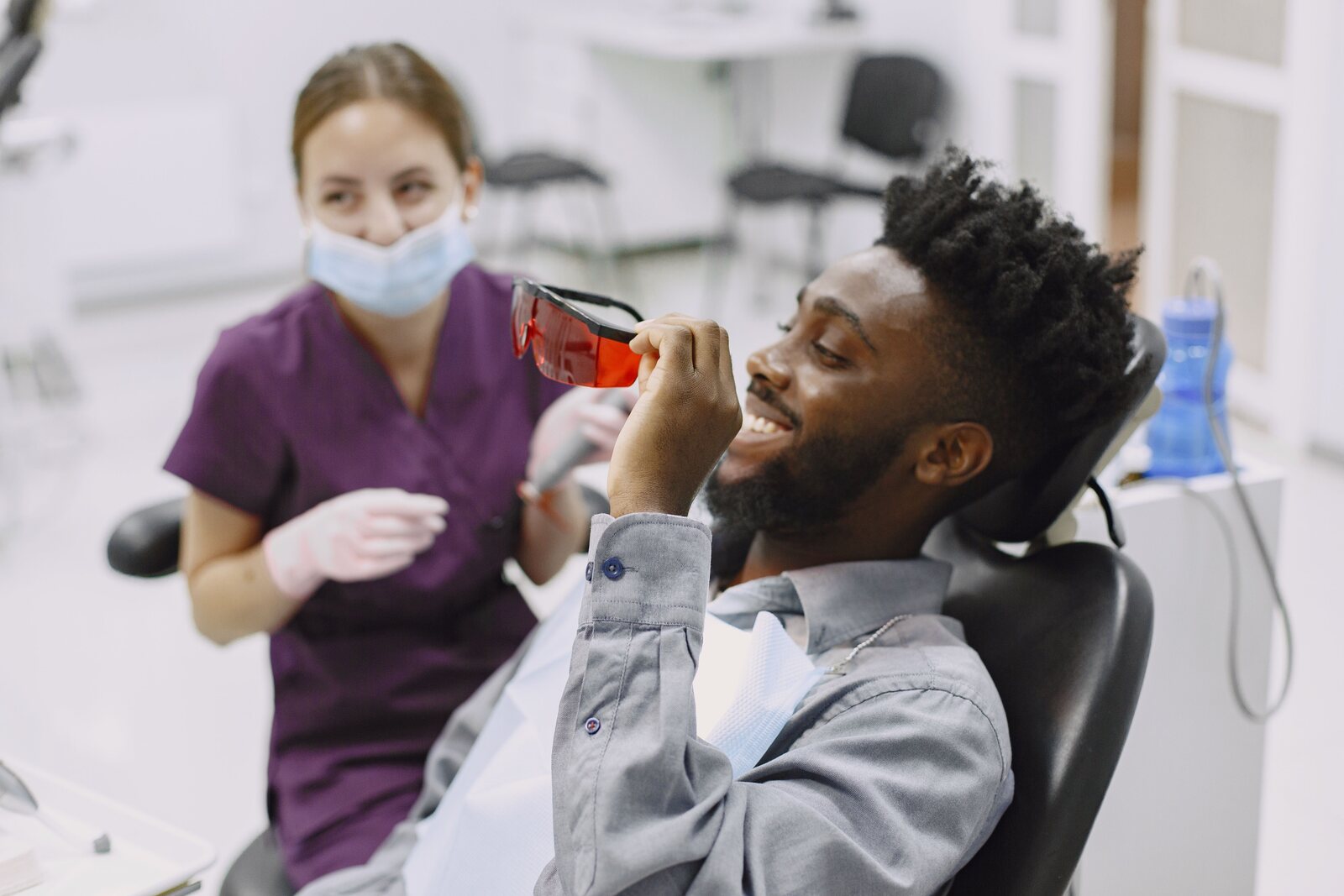 Patient smiling during a dental visit