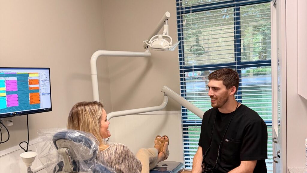 Willowdale dentist consulting with a patient in a treatment room
